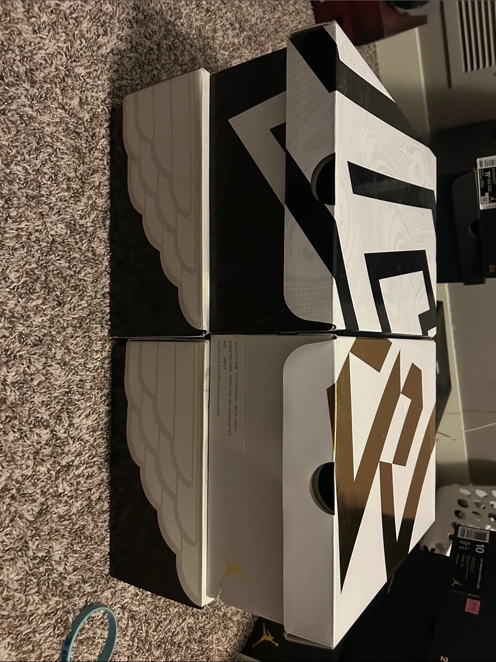 Empty Pair of Black, White & Gold storage Sneaker Boxes